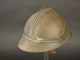 a helmet that is sitting on a stand on a table