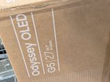 a cardboard box with a picture of a cat inside of it