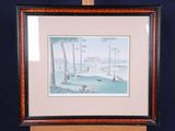 framed picture of a painting of a beach scene in a wooden frame