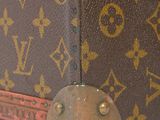a close up of a piece of luggage on a white surface