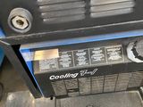 an image of a machine that is sitting on the ground