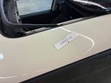 a sticker on the door of a car with a sticker on it