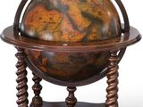 an old globe on a stand on a white background