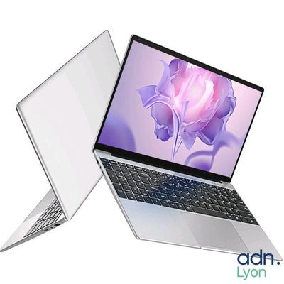 two laptops that are sitting side by side