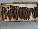a box with a bunch of wooden dows in it