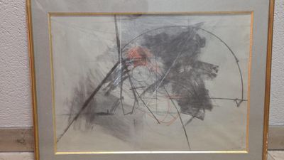 peinture sur le mur d'une pièce représentant un homme assis dans un fauteuil