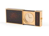 a clock that is sitting on top of a box