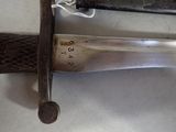 a close up of a knife on a table