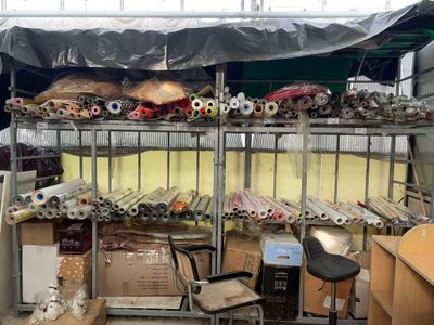 a room filled with lots of different types of furniture