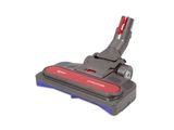 un aspirateur avec une poignée rouge sur fond blanc