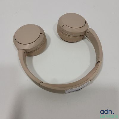 a pair of headphones sitting on a white surface
