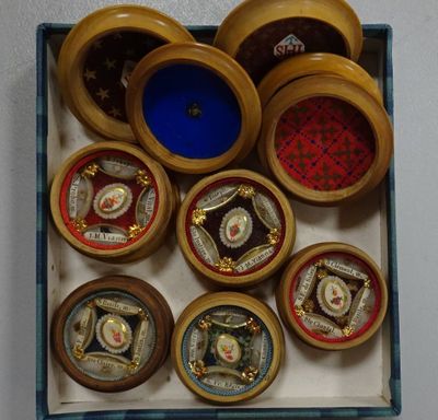 a box with many different types of watches in it