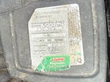 a close up of a car engine with a label on it