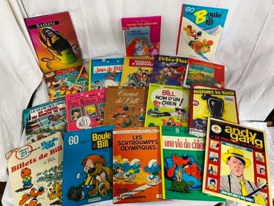 many children ' s books sitting on a white chair