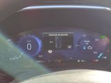 the dashboard of a car with a digital display on it