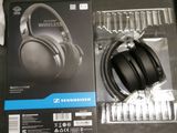 a box with a pair of headphones on top of it