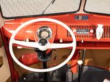 a steering wheel and dashboard of an old car