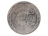 une image d'une pièce de monnaie en gros plan sur fond blanc