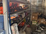 a garage with a lot of tools and boxes