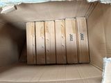 a cardboard box with a bunch of books inside of it