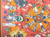 an image of a red and yellow scarf with many pictures on it