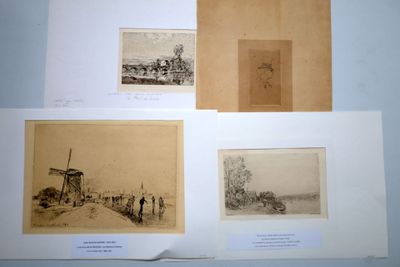 four old black and white photographs of people on a beach