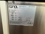 a label on the side of a stainless steel refrigerator