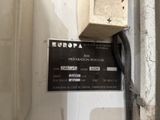 a picture of a sign on the wall of a building