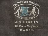 the back of a jacket with a logo on it that says equipment militaires