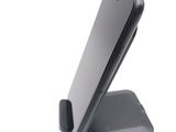 a cell phone that is sitting on top of a stand