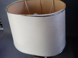 a lamp that is sitting on a table in a room