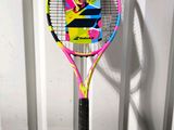 a tennis racket with a picture of a man on it