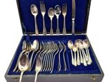 a case with silverware in it on a white background