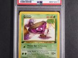 a close up of a pokemon card on a black surface