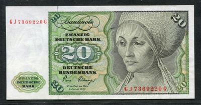 le recto d'un billet de banque sur lequel figure le visage d'une femme