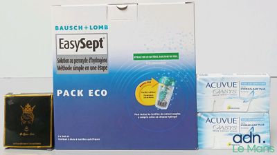 une boîte de dentifrice et un tube de dentifrice posés sur une table