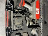 vue de dessus d'une mallette à outils contenant des outils