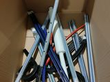 a box full of pens and pencils in it