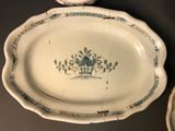 a white plate with a blue and white design on it