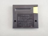 an electronic device with a yellow sticker on it