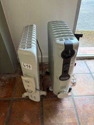 two radiators sitting on the floor next to each other