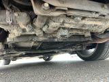 a close up view of a car ' s exhaust pipe and exhaust pipe