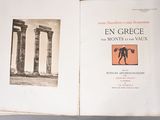 an open book with a picture of a man standing in front of two columns