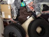 a cart full of stuff sitting on the floor