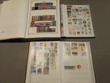 a lot of stamps on the pages of a book