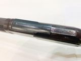 a pen that is sitting on a table with a pen in it