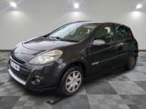 a picture of a small black car parked in a garage