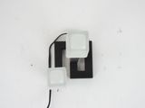a black and white light that is on the wall