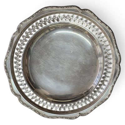 a silver plate on a white background with a white background