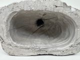 cement sculpture of a hole in the middle of a rock